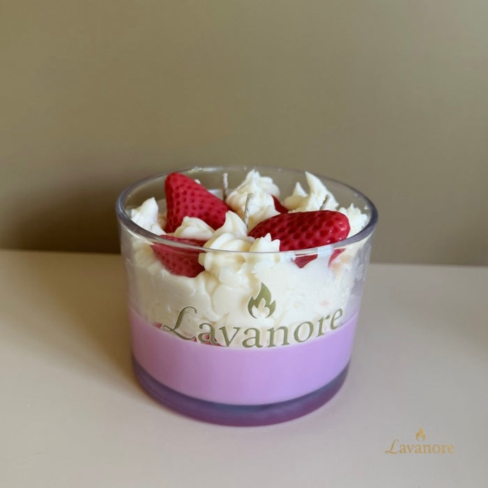 dessert with strawberries and whipped cream in a glass container on a neutral background, featuring the Lavanore brand.