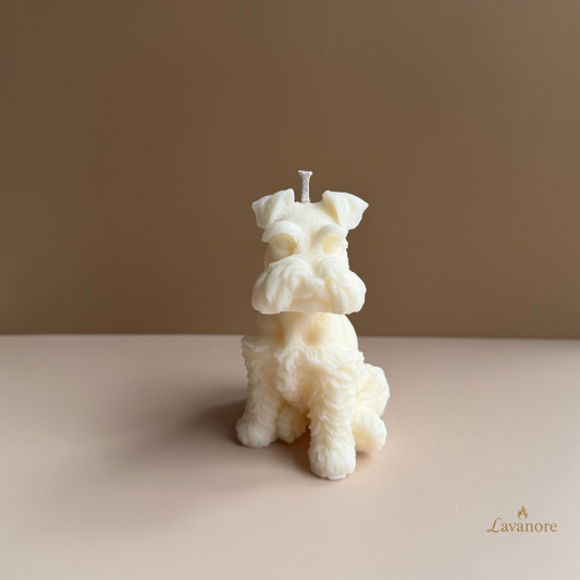 Dog-shaped candle on a beige background with 'Lavanore' branding. Schnauzer sculptural soy wax candle designed for luxury gifting and modern home décor