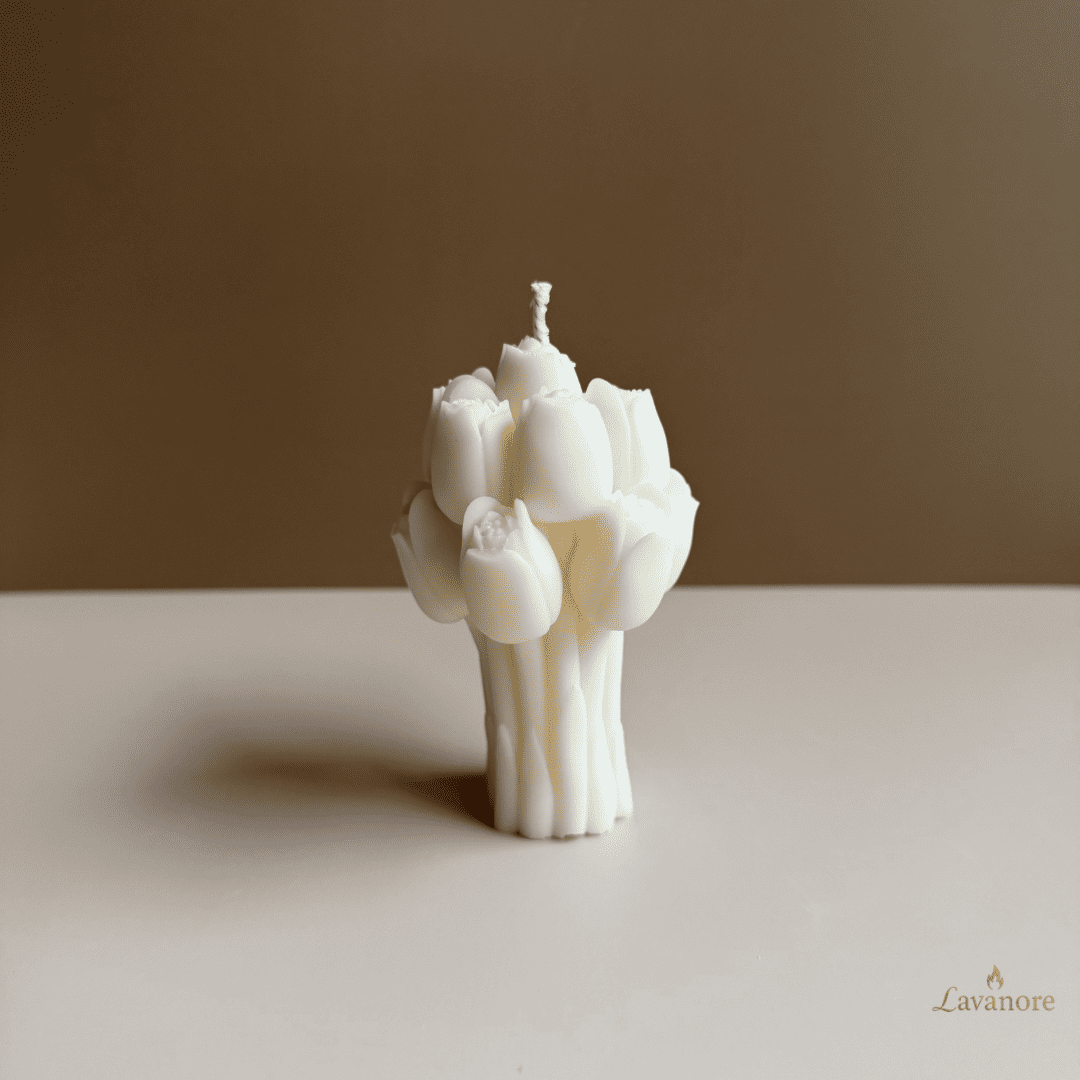 Tulip Bouquet sculptural soy wax candle for luxury gifting and elegant home décor . White tulip-shaped candle on a beige surface with a brown background