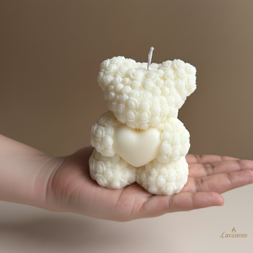 Heartfelt Rose Bear Grande sculptural soy wax candle for romantic gifting and home décor. White bear-shaped candle held in a hand against a neutral background